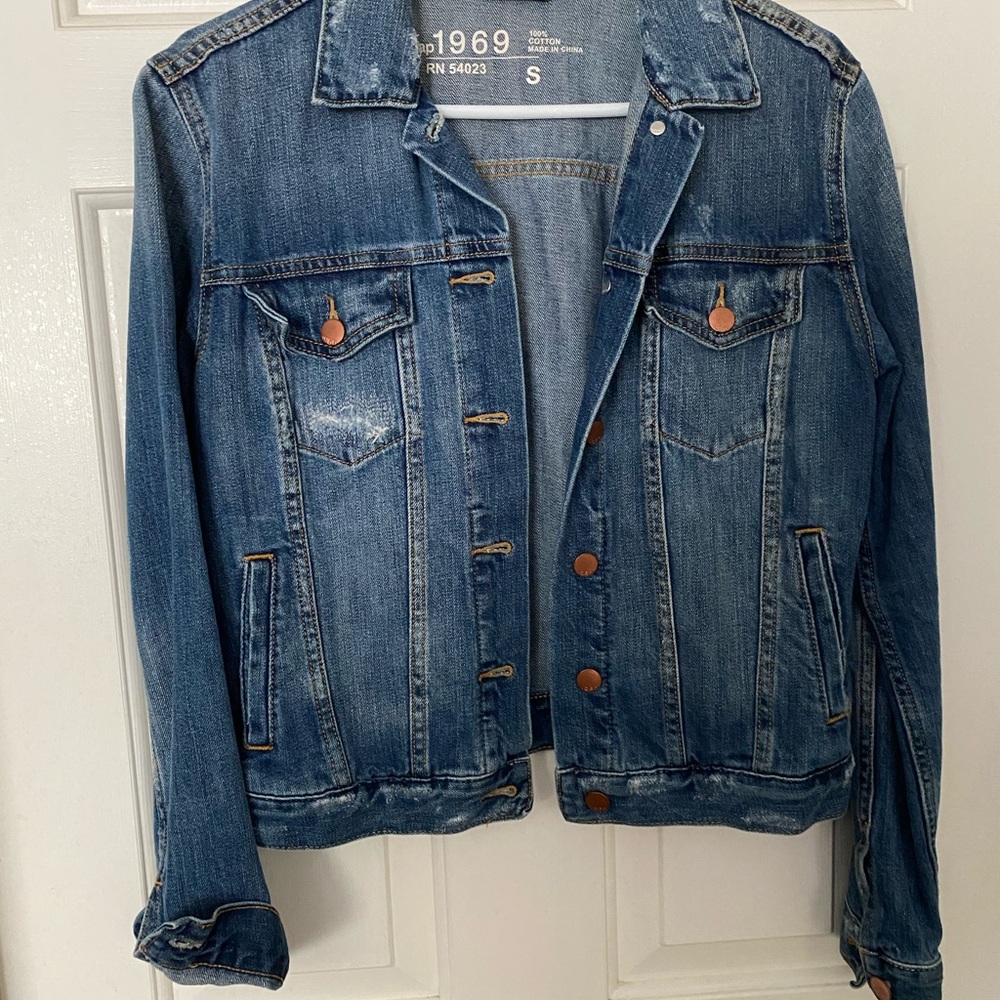 Distressed denim jacket